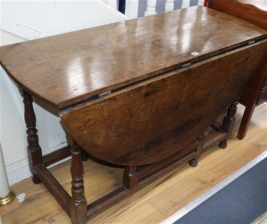 An 18th century and later oak gateleg table W.122cm